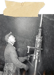 Miner drilling with a stoper